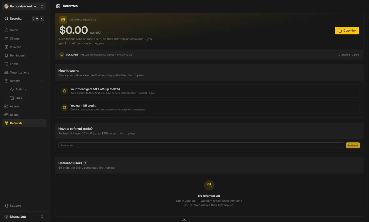Referral rewards page with a referral link and earned credit